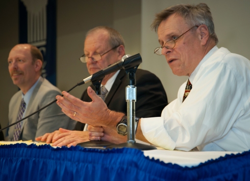 Art Paulson makes a point during the panel discussion. Also pictured are: Scott McLean (left), professor of political science at Qunnipiac University, and Gary Rose, chairman of the Sacred Heart University Department of Government and Political Science.